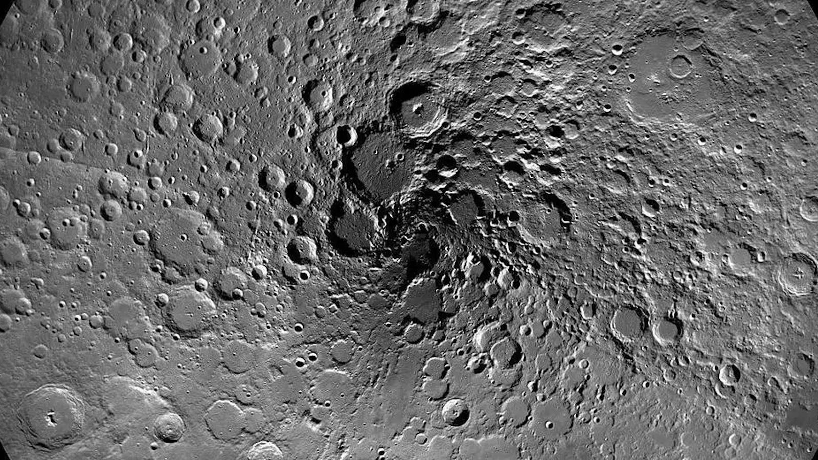 aerial photograph of craters on the Moon